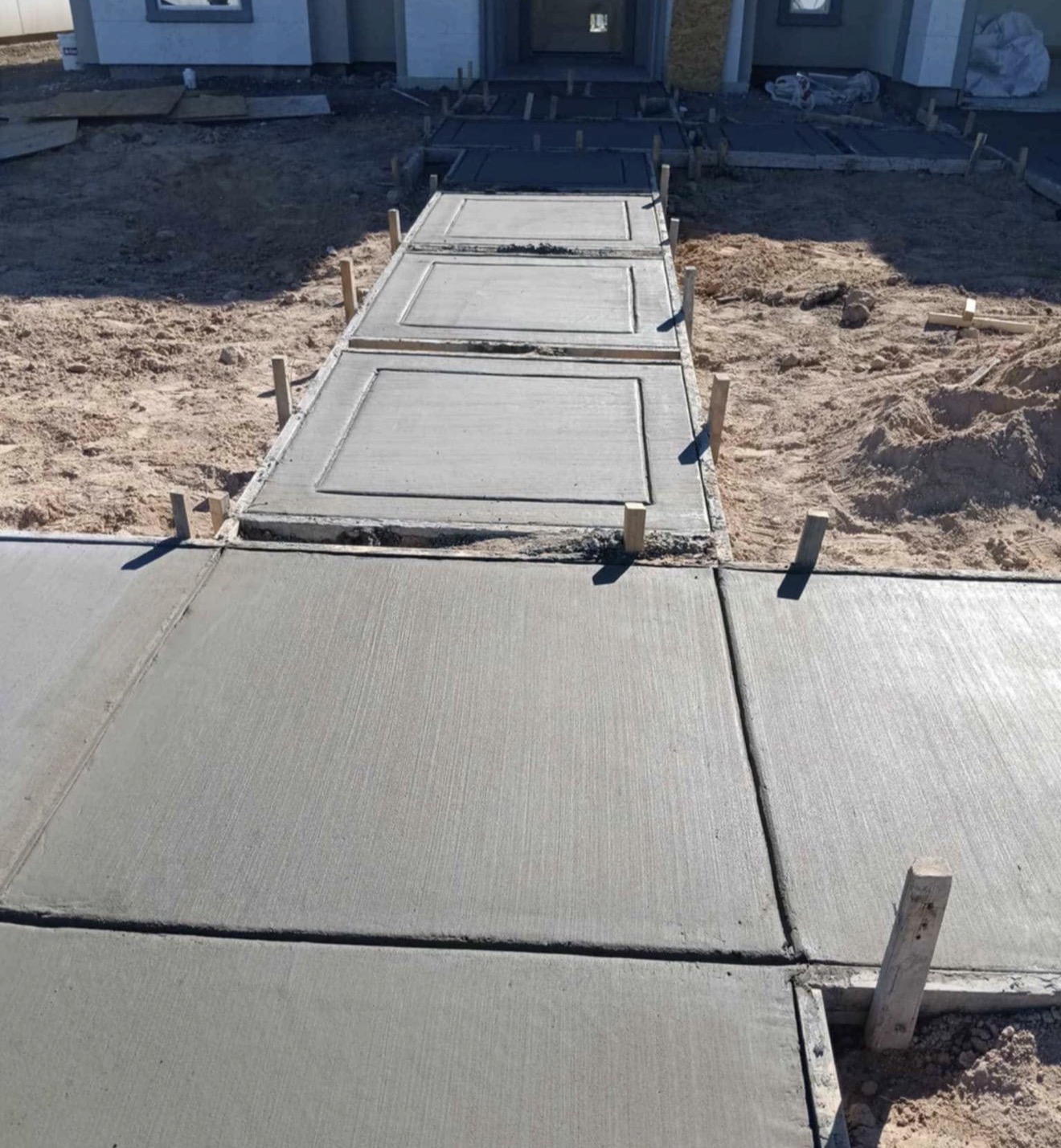 New concrete walkway being completed