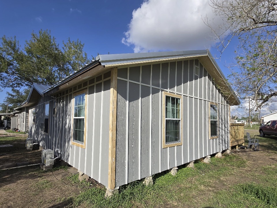 Residential siding installation in progress