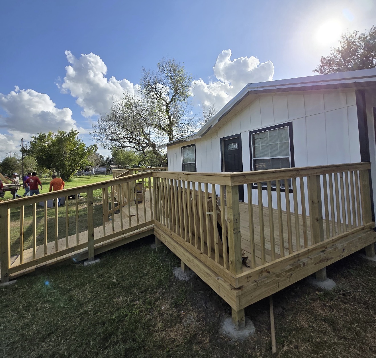 New wooden deck with accessibility ramp